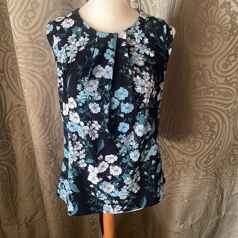 Karl Lagerfeld floral knit top with pleated neckline.
